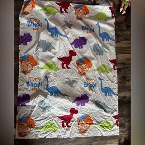 Blippi bedding. Comforter, toddler crib sheet with fitted sheet as well.